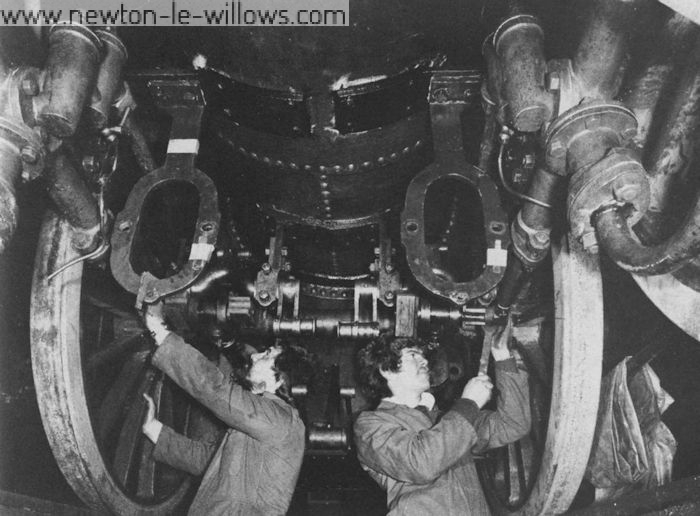 The re-assembly of Lion's motion at Vulcan Works in 1979. Gerry Moylan (left) and Philip Franklin (right), of the Lion project team are seen at work. Ruston Diesels Ltd