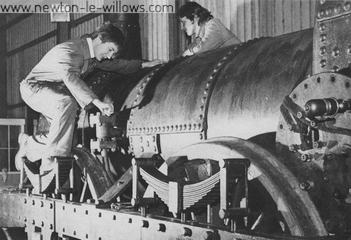 Ruston Diesels Ltd graduate trainees, Elgan Jones and Anne Innes with Lion shortly before the boiler tests. The boiler feed water clack valves are being tightened. Ruston Diesels Ltd 