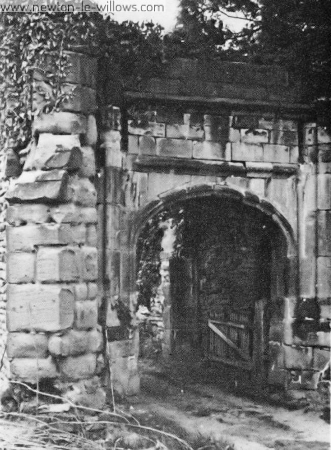 All that remains of the entrance to Bradleigh Hall—once the Manor House of Burtonwood—with the original cobbles still visible.