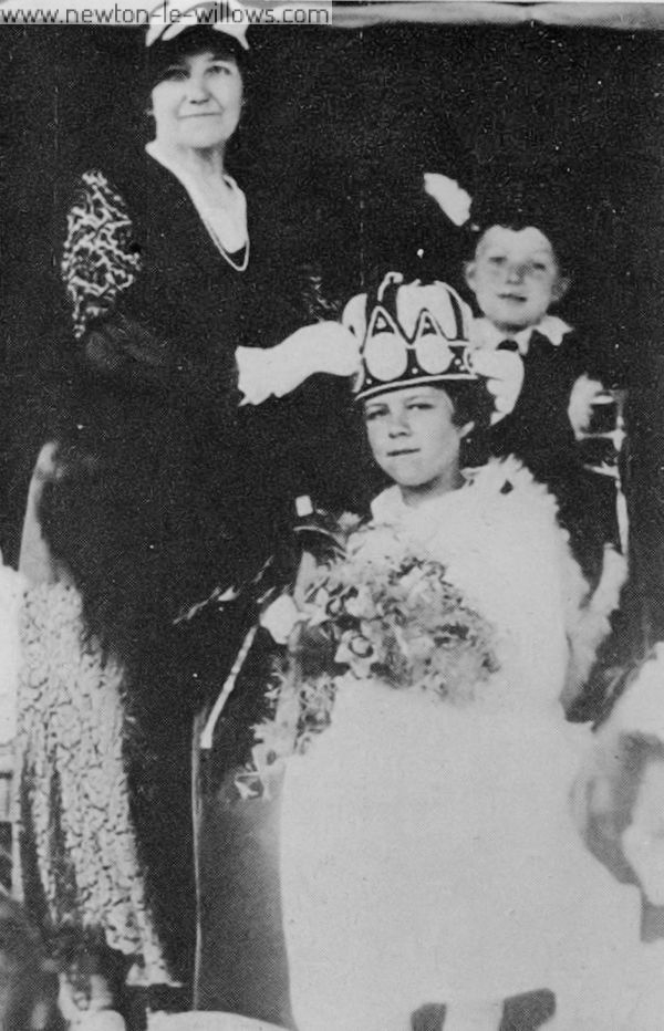 Crowning of the village Dahlia Queen. Date unknown.